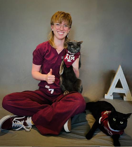 women holding a pet